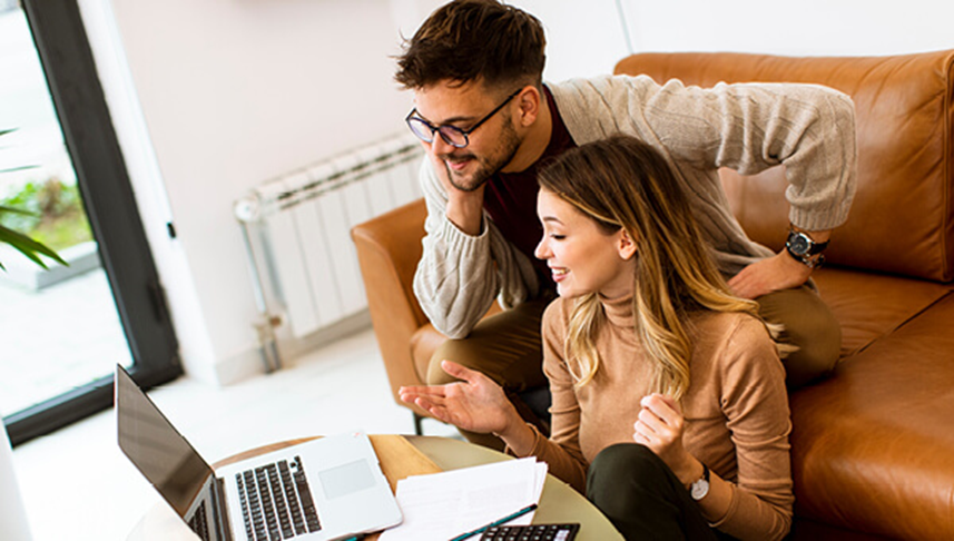 Couple looking at laptop